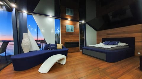 Domy na wodzie Charzykowy Docked boat in Pomeranian Voivodeship