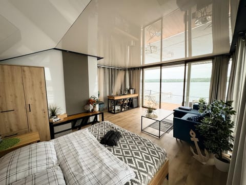 Domy na wodzie Charzykowy Docked boat in Pomeranian Voivodeship