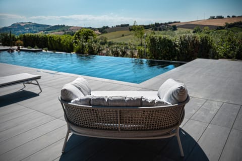 Patio, Day, Natural landscape, Seating area, Mountain view, Pool view, Swimming pool, sunbed