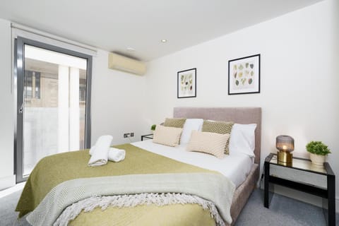 Bed, Photo of the whole room, Bedroom, towels, air conditioner