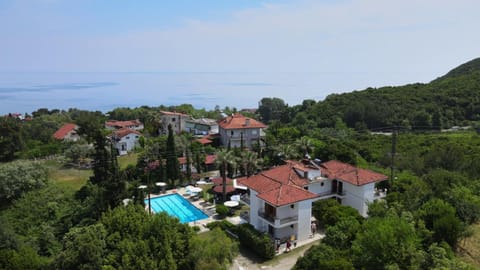 Property building, Natural landscape, Bird's eye view, Swimming pool