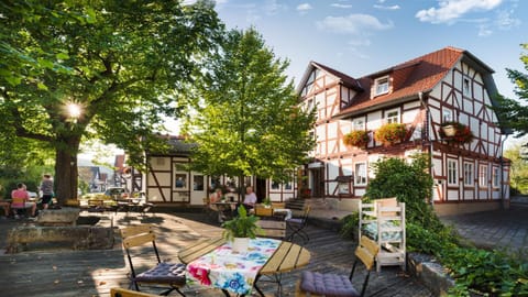 Property building, Restaurant/places to eat, Facade/entrance, Garden, View (from property/room), Balcony/Terrace