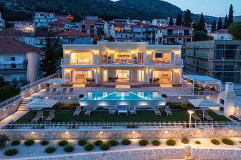 Property building, Night, Natural landscape, Pool view, Swimming pool, sunbed