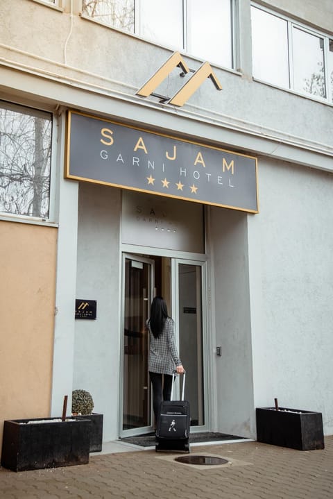 Facade/entrance, People, Property logo or sign, View (from property/room), Decorative detail, Guests