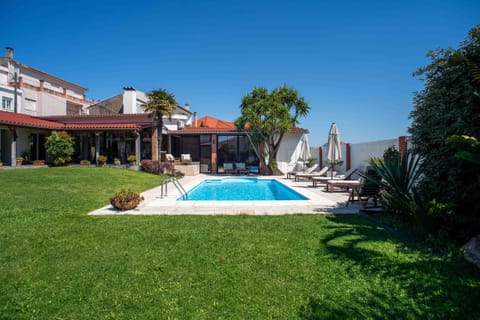 Property building, Patio, Garden, Garden view, Pool view, Swimming pool, sunbed