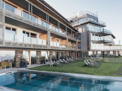 Property building, Pool view, Swimming pool, sunbed