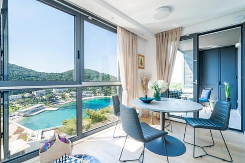 Day, View (from property/room), Living room, Seating area, Dining area