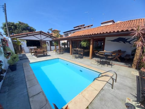Property building, Patio, Day, Pool view, sunbed