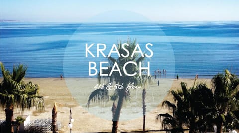 Nearby landmark, Day, Property logo or sign, Natural landscape, Winter, View (from property/room), Balcony/Terrace, Beach, Text overlay, Sea view