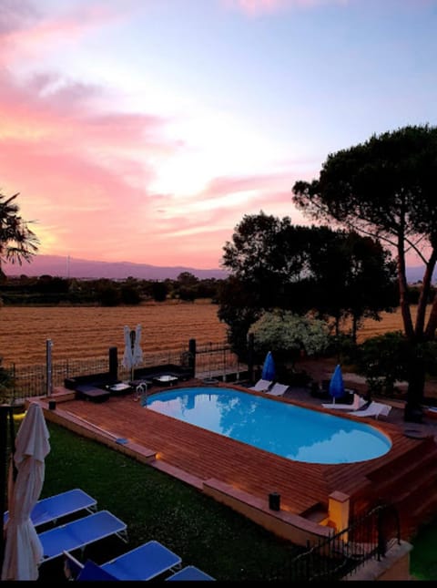 Natural landscape, Pool view, Swimming pool, Sunset, sunbed