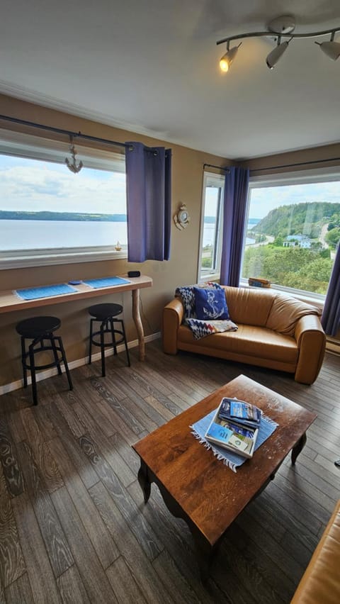 Natural landscape, Living room, Seating area, Dining area, Lake view, Landmark view, River view, Sunset