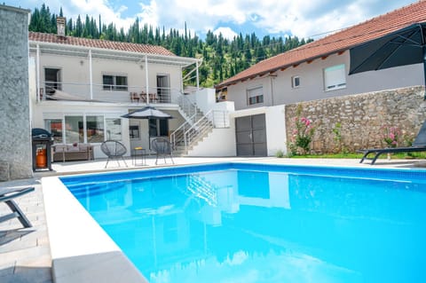 Property building, Pool view, Swimming pool, sunbed