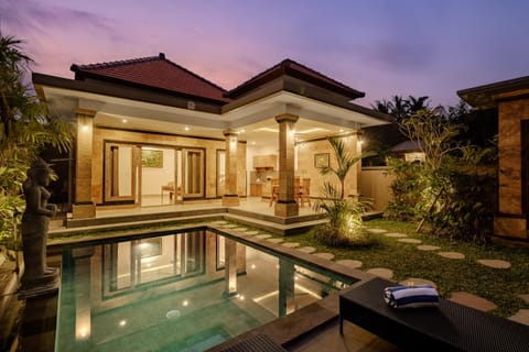 Property building, Patio, Night, Pool view, Swimming pool, sunbed