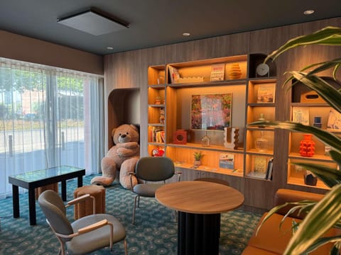 Property building, Library, Living room, Seating area, children