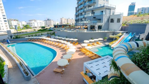 Property building, View (from property/room), Seating area, Pool view, Swimming pool, sunbed