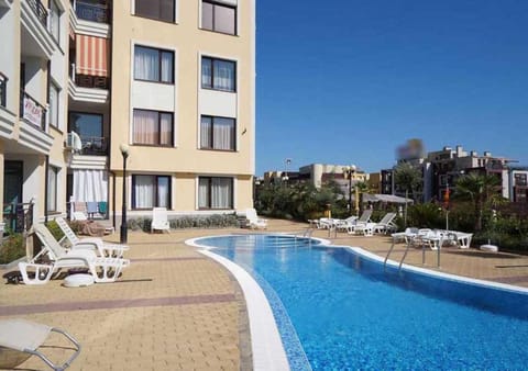 Swimming pool, sunbed