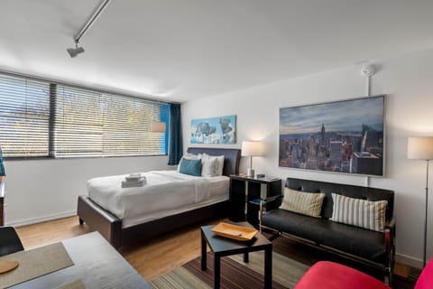 Bed, Living room, Seating area, Bedroom