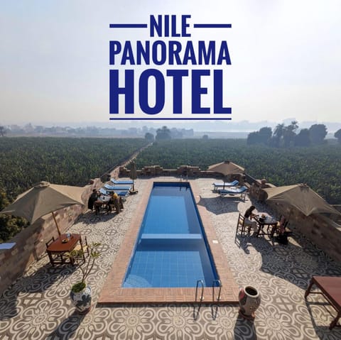 Day, Property logo or sign, Natural landscape, City view, Pool view, River view, Swimming pool, sunbed