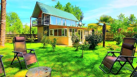 Property building, Patio, Garden, Garden view, sunbed