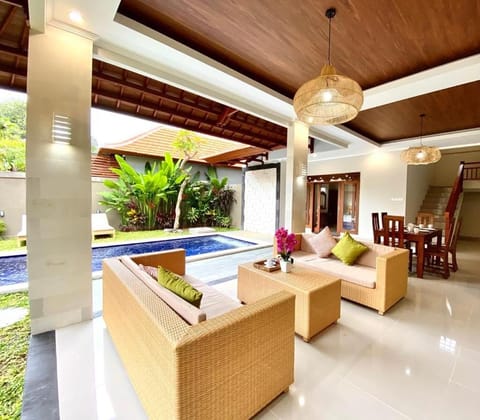 Living room, Seating area, Pool view