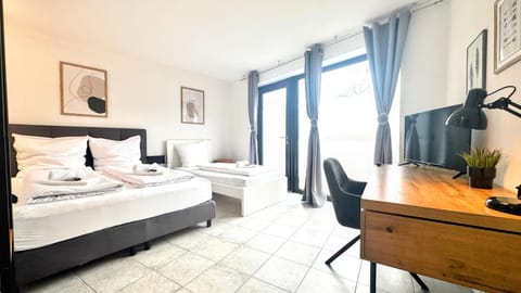 Bed, TV and multimedia, Seating area, Bedroom, wardrobe