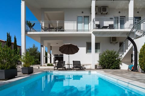Property building, View (from property/room), Balcony/Terrace, Pool view, Swimming pool, sunbed