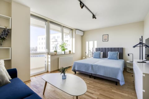 Bed, Living room, Seating area, Bedroom