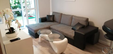 Bed, Living room, Photo of the whole room, Seating area, Garden view, Quiet street view