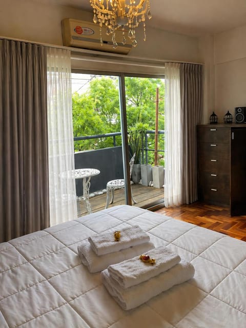 Bedroom, furniture, towels, air conditioner