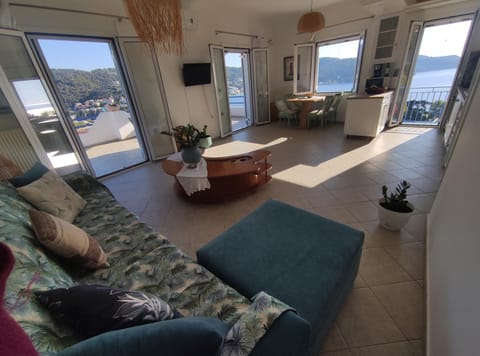 TV and multimedia, View (from property/room), Living room, Seating area, Mountain view, Sea view