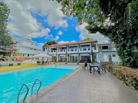 Property building, Patio, Spring, Day, People, Property logo or sign, Garden, View (from property/room), Balcony/Terrace, Food, Garden view, Landmark view, Pool view, Swimming pool, sunbed, VIP
