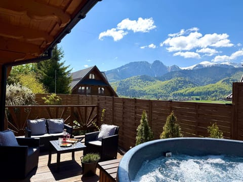 Patio, Nearby landmark, Spring, Day, Natural landscape, Hot Tub, Mountain view, sunbed