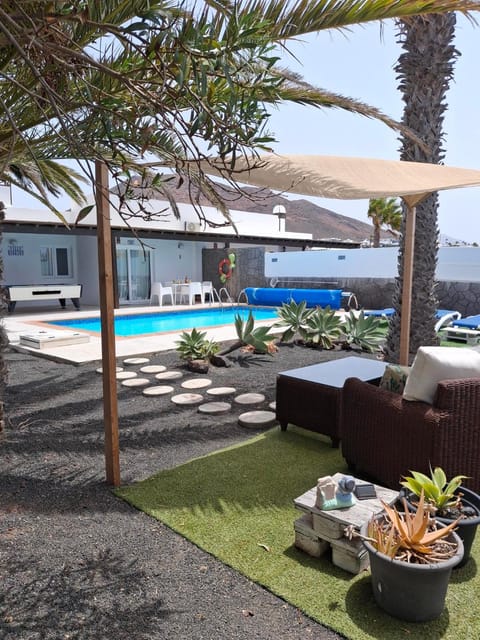 Property building, Living room, Swimming pool