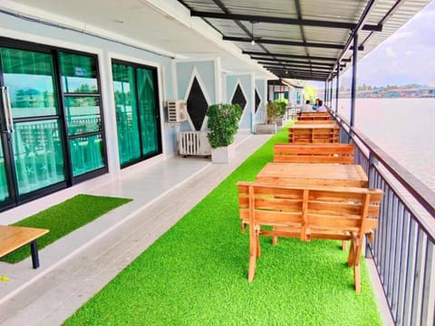 Property building, Patio, Day, View (from property/room), Balcony/Terrace, Living room, Seating area, River view
