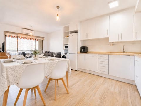 Kitchen or kitchenette, dishwasher, microwave, stove, kitchen, air conditioner