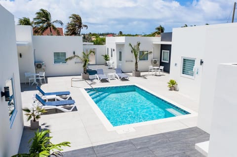 Property building, Pool view, Swimming pool, sunbed