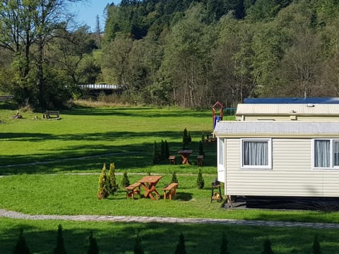 Off site, Day, Neighbourhood, BBQ facilities, Garden, Garden, Seating area, On site