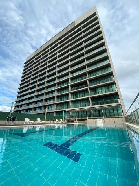 Property building, Day, Pool view, Swimming pool, sunbed