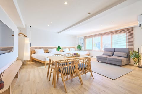 Bed, Living room, Seating area, Dining area