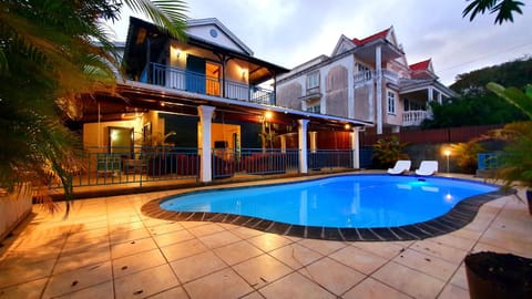 Property building, Swimming pool, Sunset