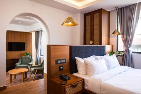 Bed, Living room, Seating area, Bedroom