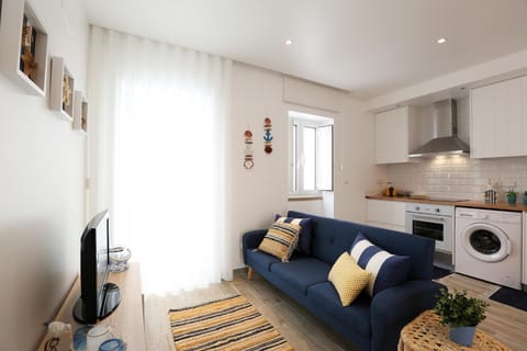 TV and multimedia, Kitchen or kitchenette, Living room, Seating area, dishwasher, oven, stove, washing machine