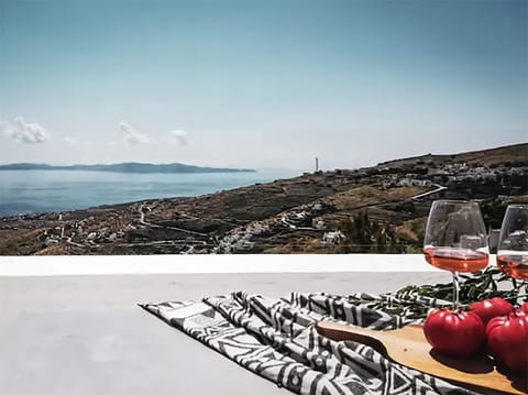 Property building, Natural landscape, Balcony/Terrace, Dining area, Mountain view, Sea view, Sunset