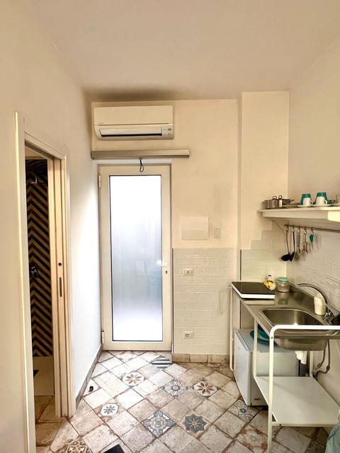 Kitchen or kitchenette, stove