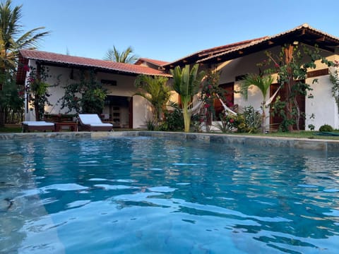 Property building, Day, Pool view, Swimming pool, sunbed