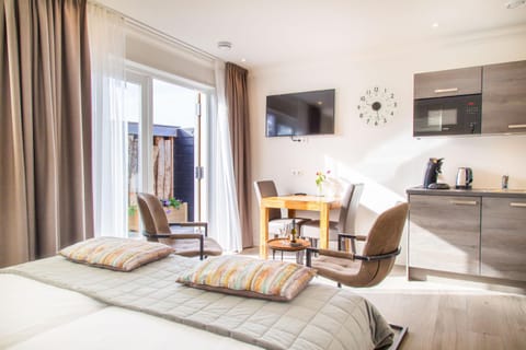Luxe kamer Chambre Renard met eigen terras Bed and Breakfast in Zoutelande
