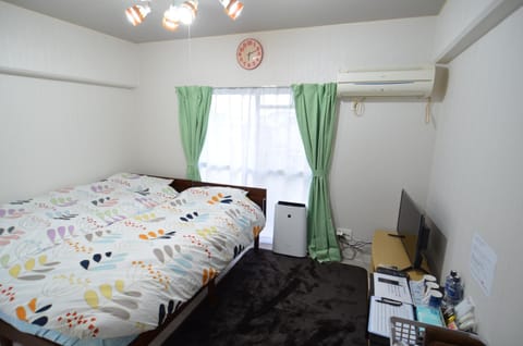 Photo of the whole room, air conditioner