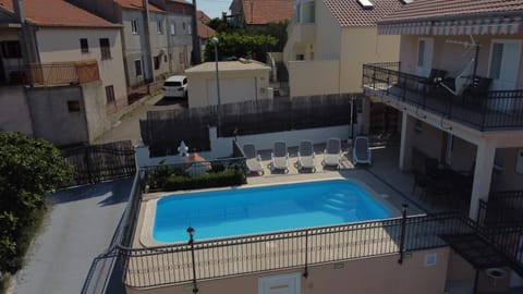 Property building, Patio, Day, Pool view, Parking