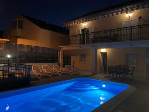 Property building, Patio, Night, Swimming pool
