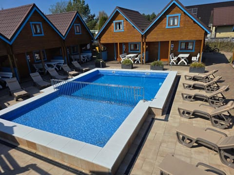 Domki Rekin Podgrzewany basen z brodzikiem oraz klimatyzacją House in West Pomeranian Voivodeship, Poland